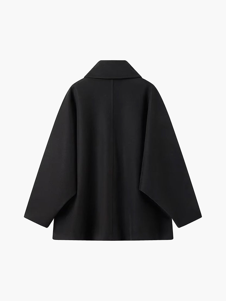 Kort damefrakke med revers og oversized pasform