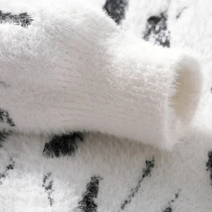 Damestriktrøje med abstrakt design