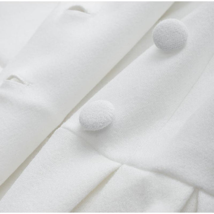 Lang damefrakke med slids foran