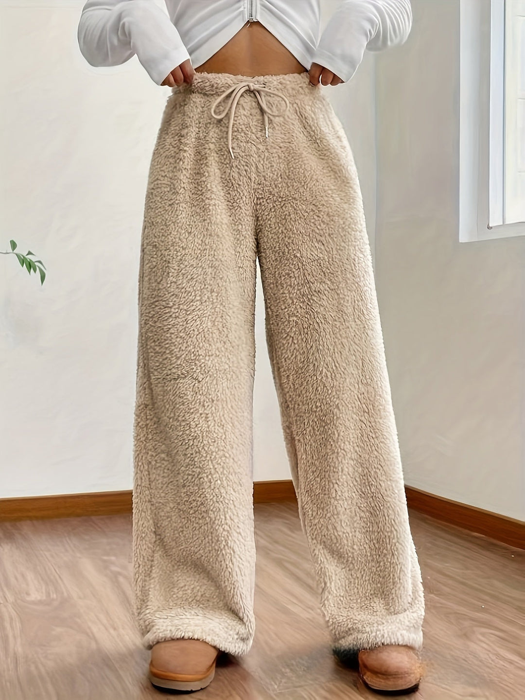 Dames bukser i teddyfleece med elastisk talje