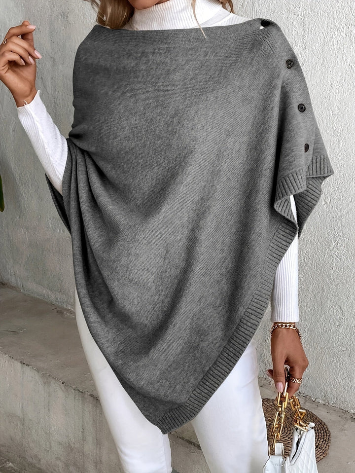 Dame poncho med knapper og struktur