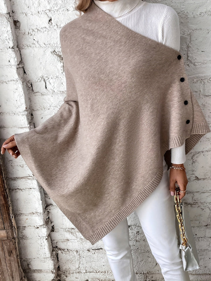 Dame poncho med knapper og struktur