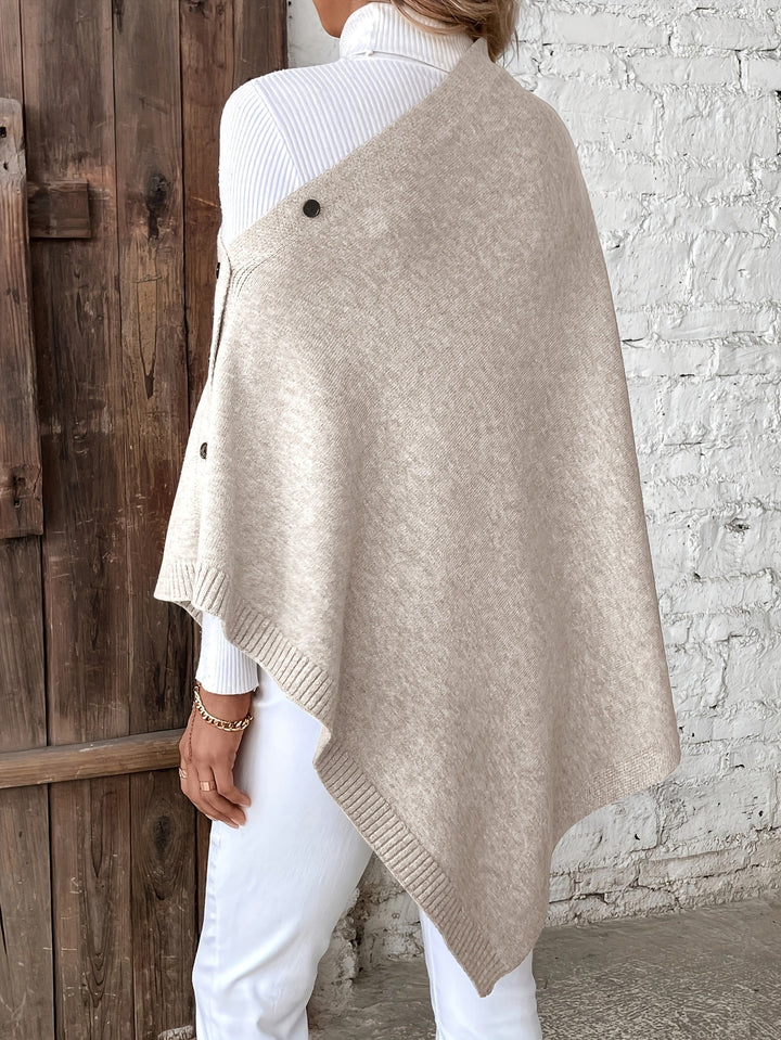Dame poncho med knapper og struktur