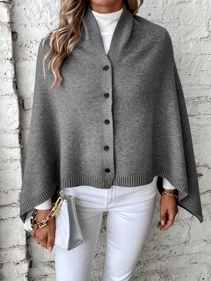 Dame poncho med knapper og struktur